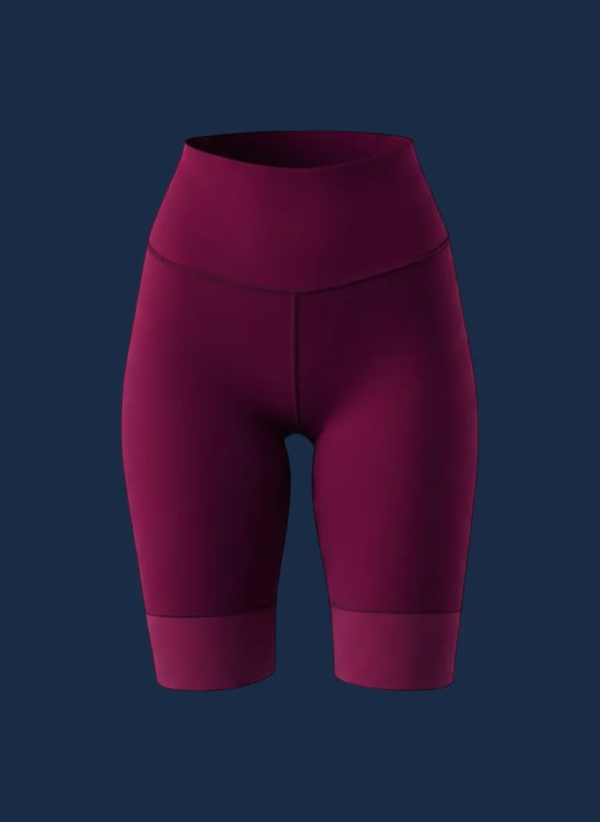 High-waisted bike short manufacturer Karachi Pakistan showing plum women's compression bike short with wide flatlock-seamed compression waistband and slim mid-thigh silhouette, performance polyester-spandex knit, front view
