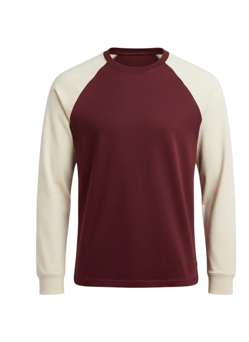 Burgundy long-sleeve raglan T-shirt with cream contrast sleeves manufactured by Apex Corporation knitwear factory in Karachi Pakistan, ghost mannequin product photography